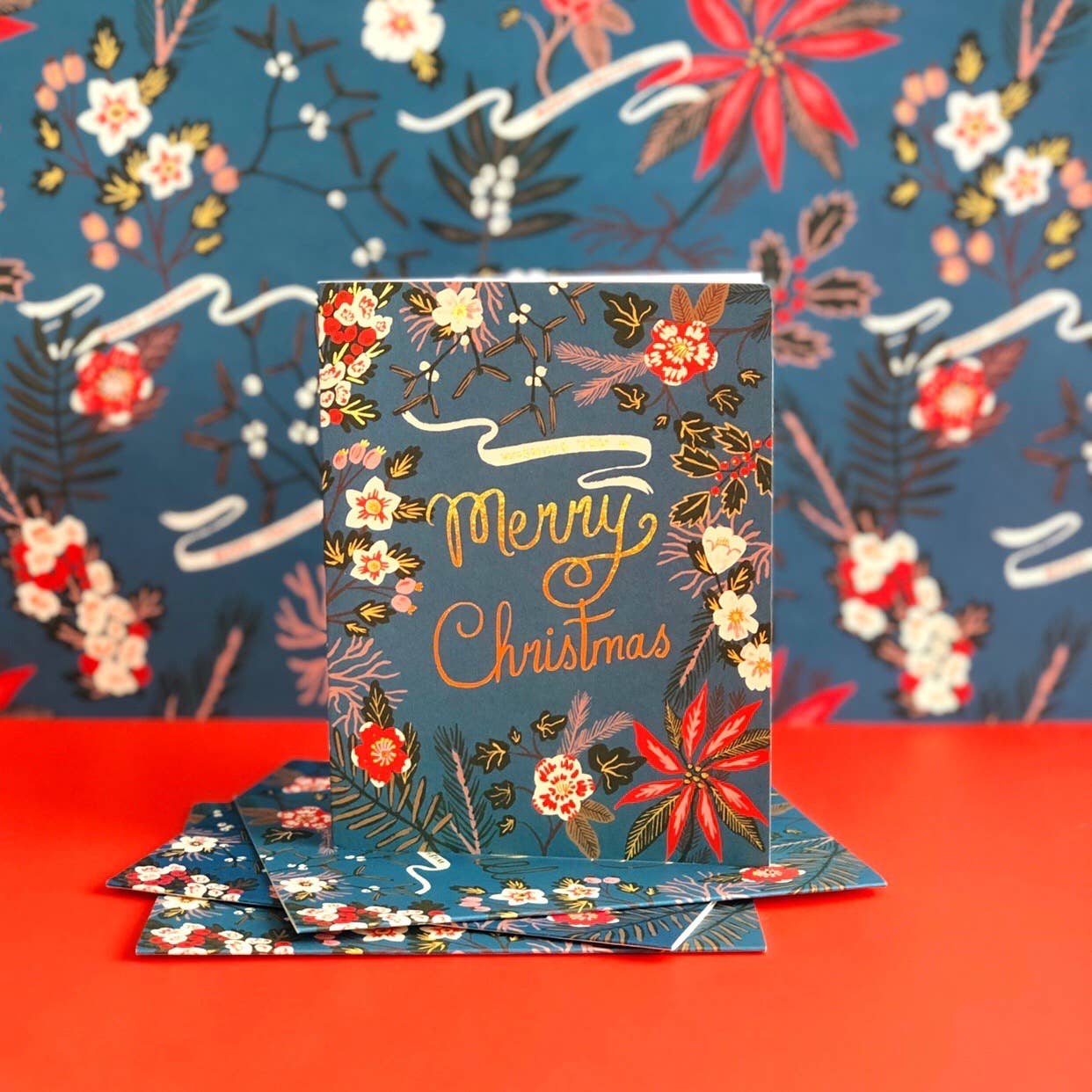 Blue Poinsettia holiday wrapping paper